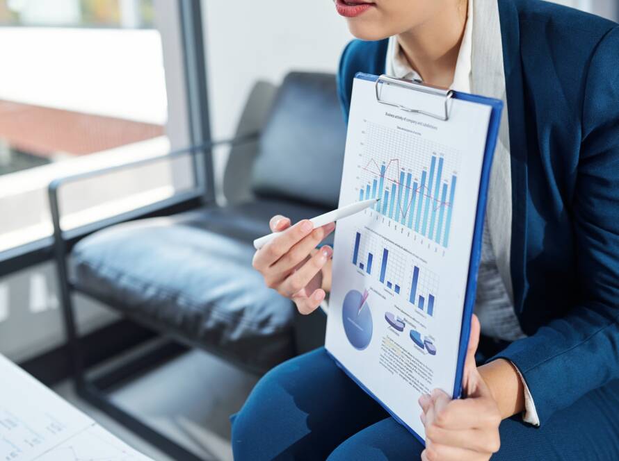 Businesswoman showing chart