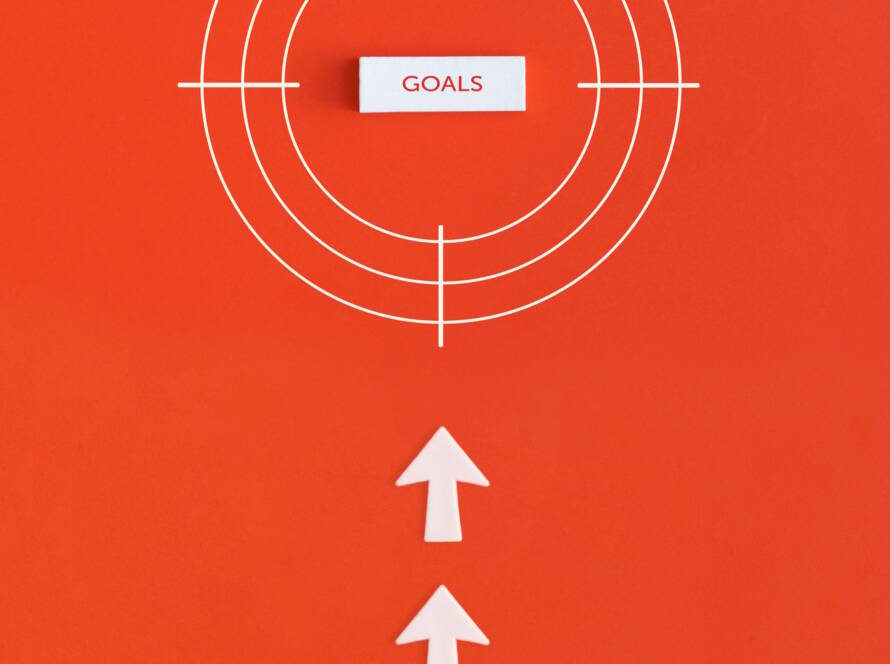 Goal word in the center of the target on red background.
